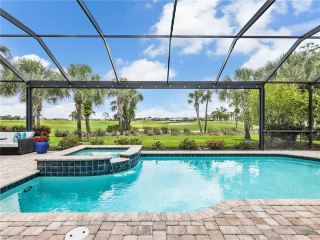 Lighted Heated Pool & Spa with Gas & Solar Heating with Fantastic View of the 17th Hole of the Golf Course, Panoramic Screen Enclosure & Privacy Hedges on Both Sides