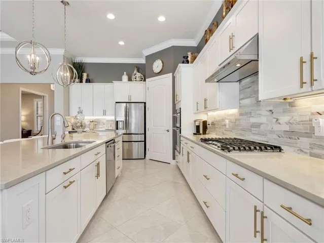 Gourmet Kitchen with White Shaker Cabinets & Modern Hardware, Large Island with Extra Storage & Stainless Steel Single Basin Sink, RO Water Filter, Pantry, & Frigidaire Refrigerator
