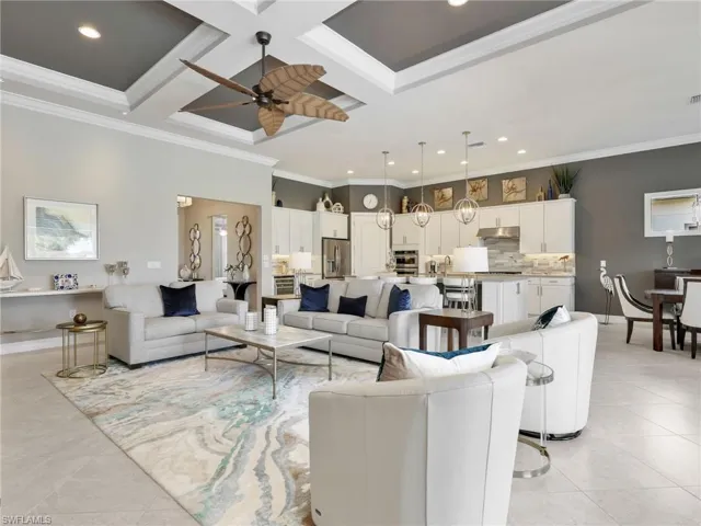 Great Room, Gourmet Kitchen with Island, Pendant Lighting, Dining Area & Crown Molding