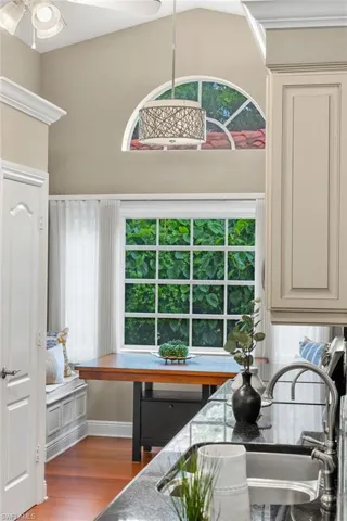 Dining room featuring ceiling fan and wood finished floors