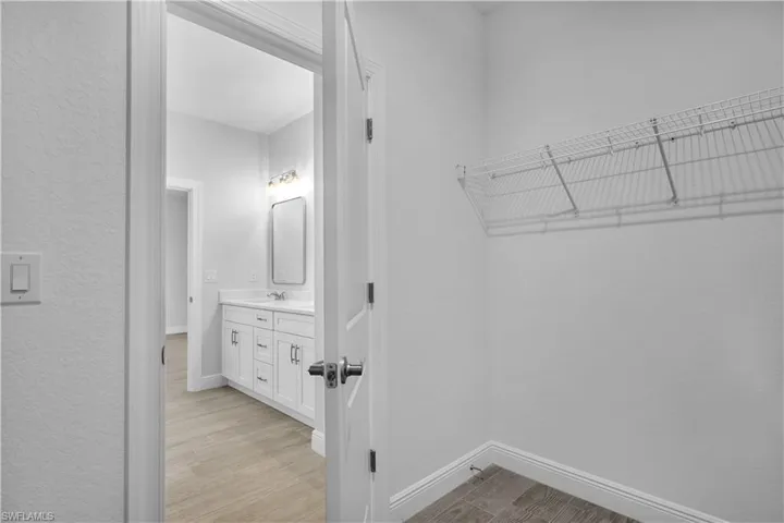 Walk Thru Closet from Ensuite to Laundry Room