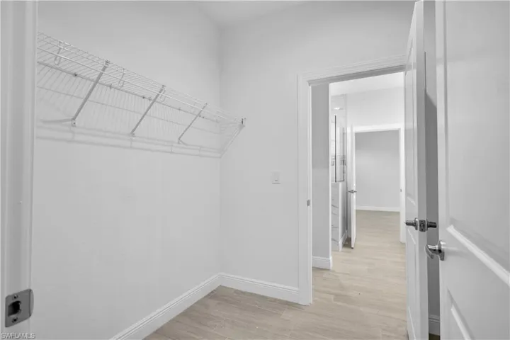 Walk Thru Closet from Ensuite to Laundry Room