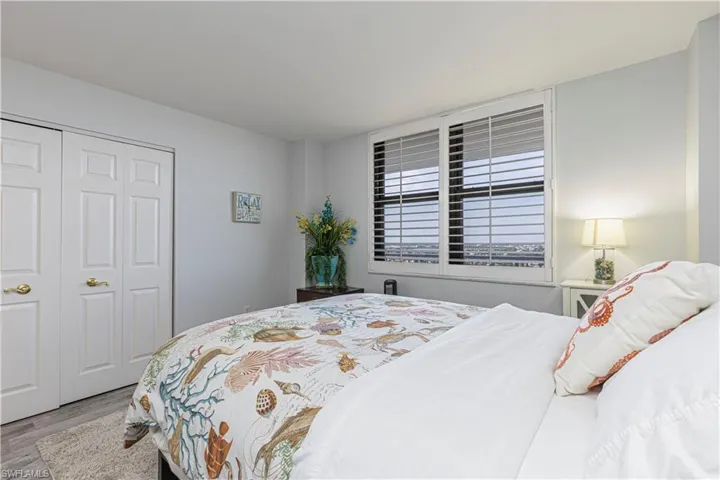 Bedroom featuring a closet and hardwood / wood-style flooring
