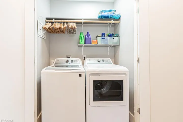 Laundry room on main floor with separate washer and dryer