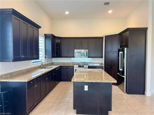 Kitchen with pantry and plenty of cabinetry