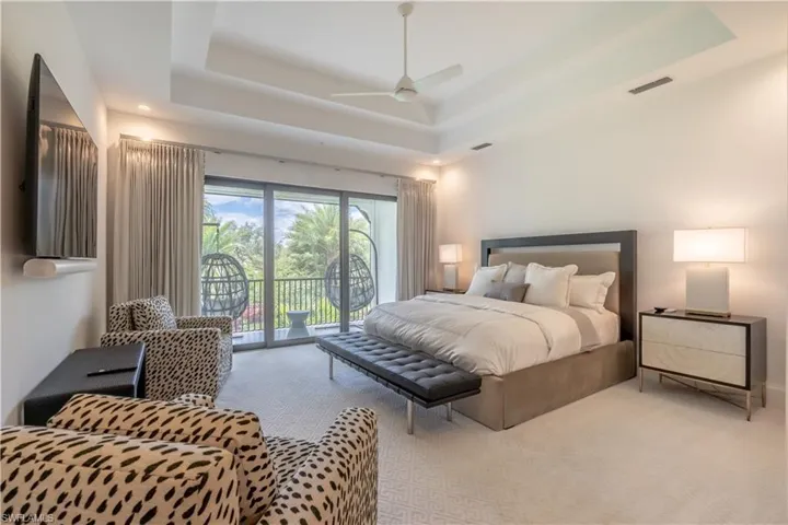 Primary bedroom with wrap around lanai