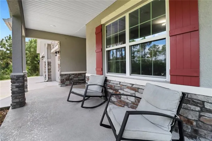 View of patio with covered porch