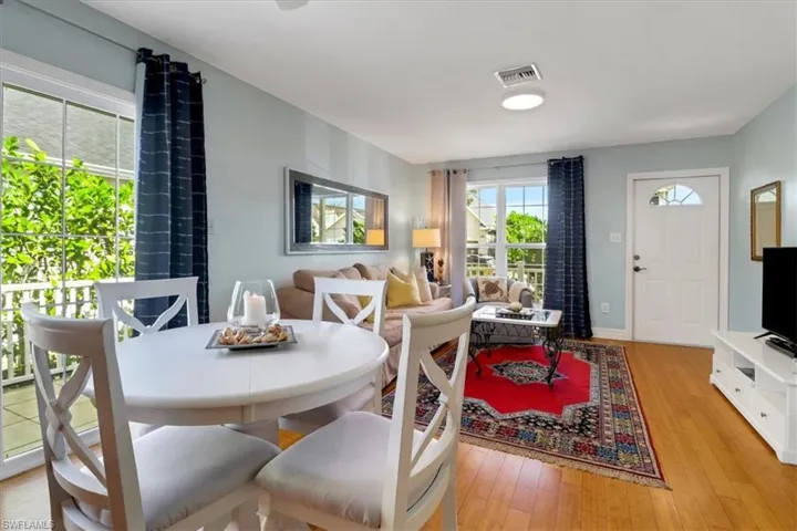 Dining space featuring lbamboo lflooring