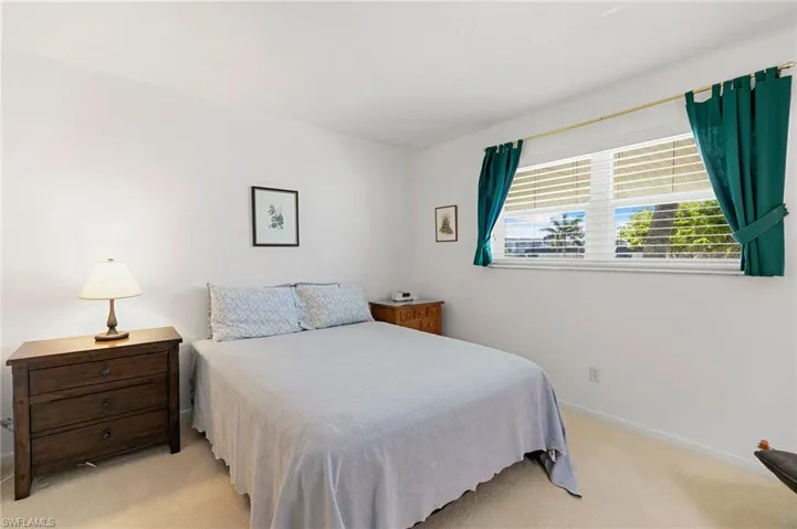 Guest bedroom with double high impact window