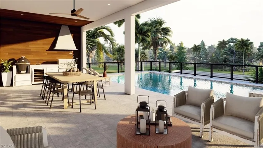 Virtual Rendering - View of swimming pool featuring an outdoor kitchen, a patio, and outdoor dining space