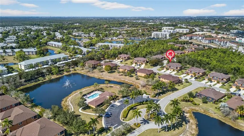 Aerial overview of property's location featuring a large body of water