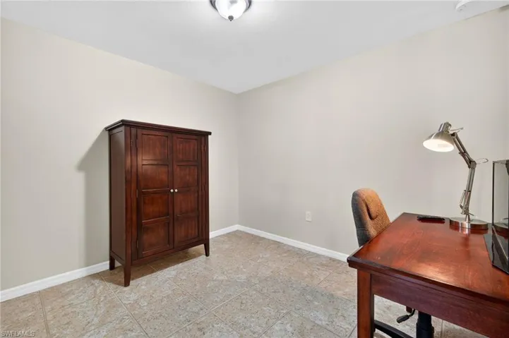 Home office featuring baseboards