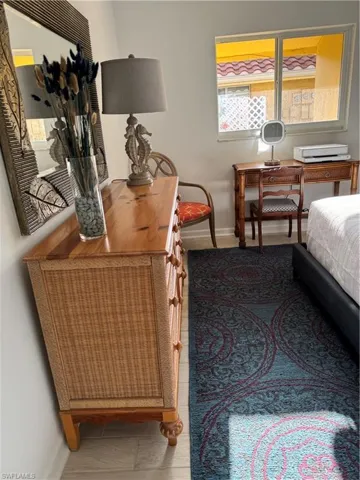 Bedroom featuring baseboards