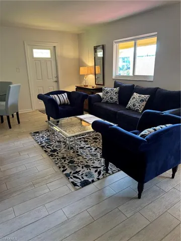Living room with wood finish floors