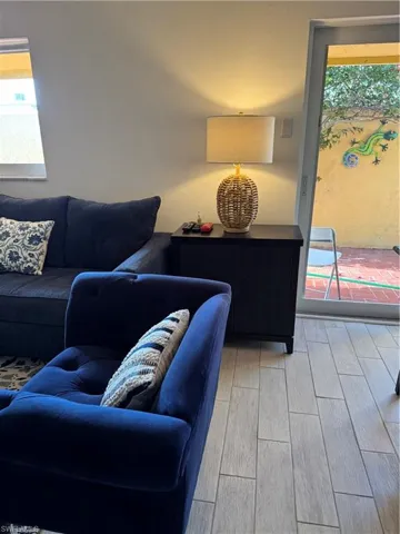 Living area featuring wood finish floors