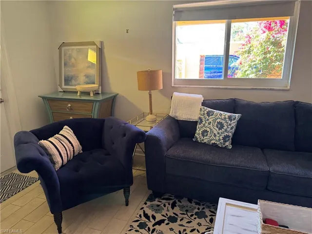 Living area featuring wood finished floors