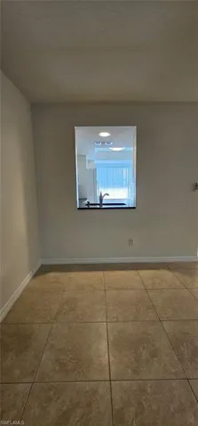 Dining room featuring light tile patterned floors