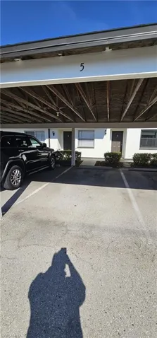 Your Space under Car Port and unit is infront.