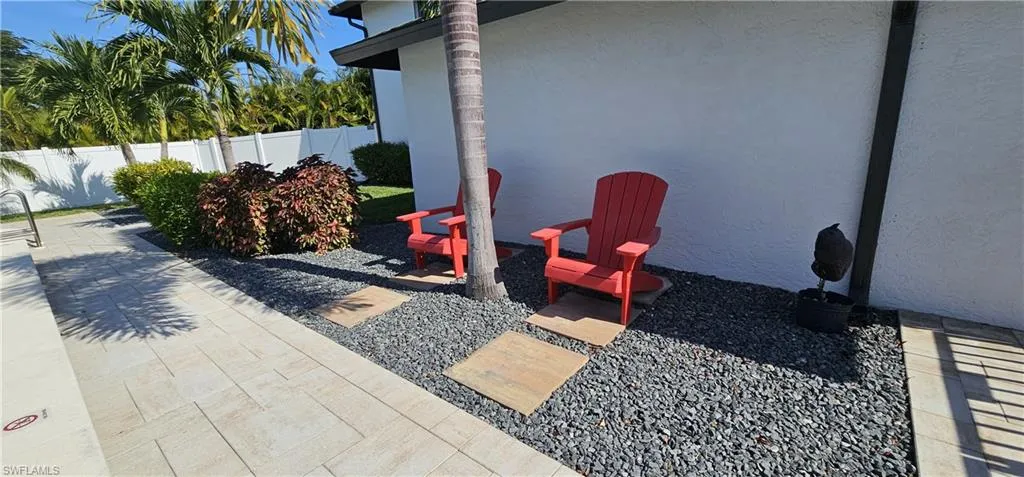 View of fenced backyard
