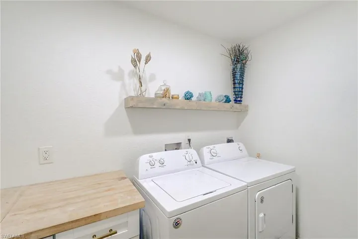 Laundry room with separate washer and dryer