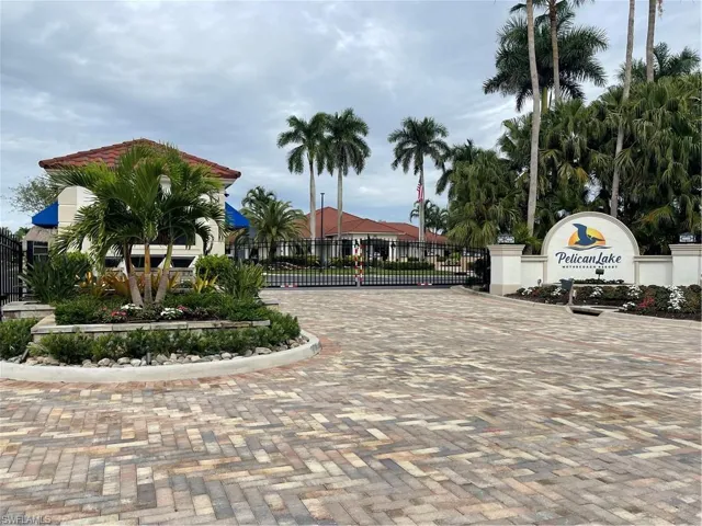 View of home's community featuring a gate