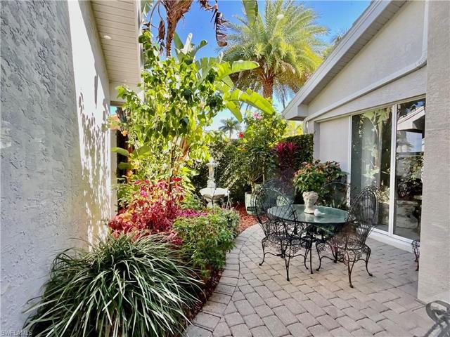 Full guest suite features a view of the courtyard.  Bed pictured is a full-sized bed.