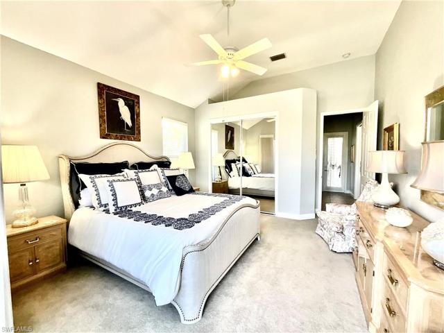 Full Guest Suite overlooks lanai, pool, golf course and lakes.  Bed in picture is a king-sized bed.