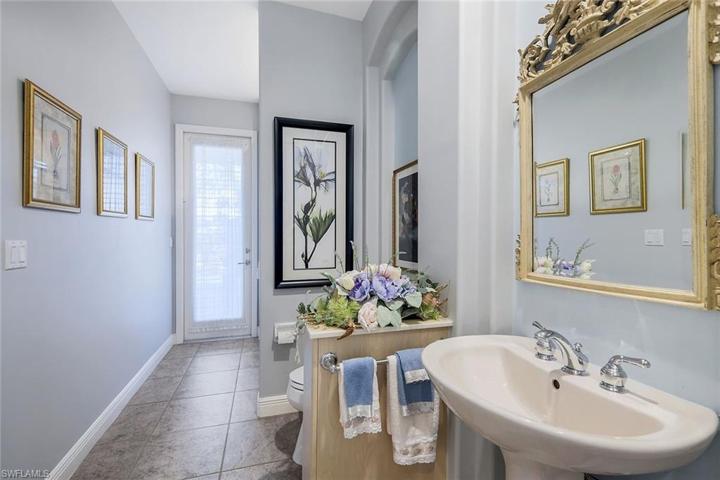 Full Pool Bathroom accessible from pool area.