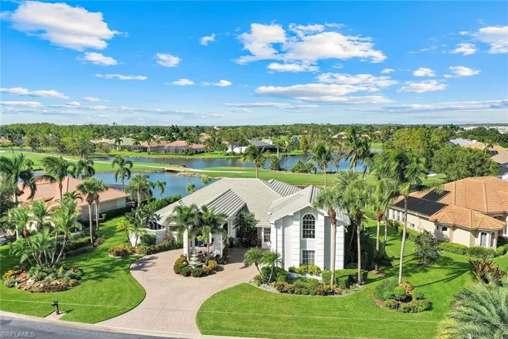 Front of Residence faces the south and overlooks a water preserve filled with aquatic loving birds.