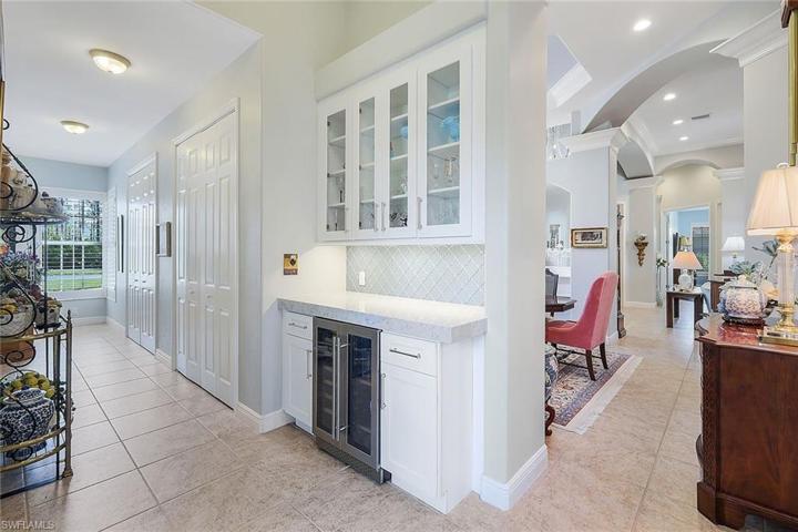 Pool Bath that is easily accessible from the pool or can be used by guests spending time in the grand entry/ Living Room/ Den / Office area.