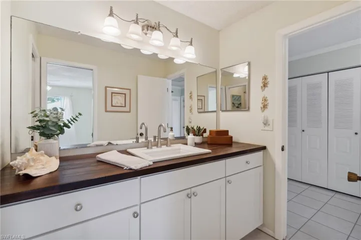 Bathroom featuring vanity and tile patterned floors