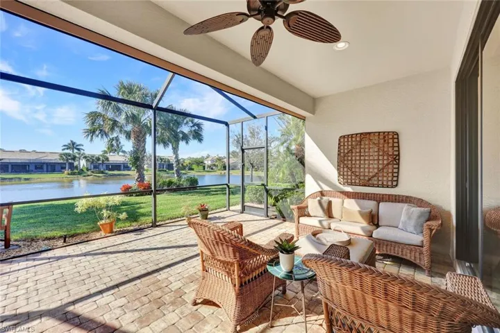 Lovely lanai with fan, electric storm shutter overlooking gorgeous lake views!