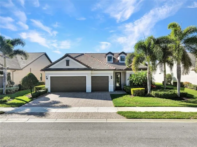 View of front facade with a 3 car garage