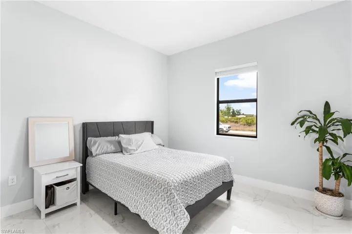 Bedroom with baseboards