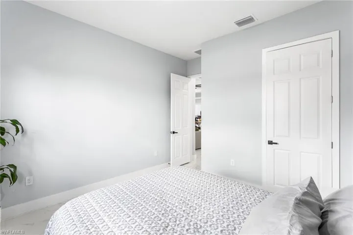 Bedroom with baseboards