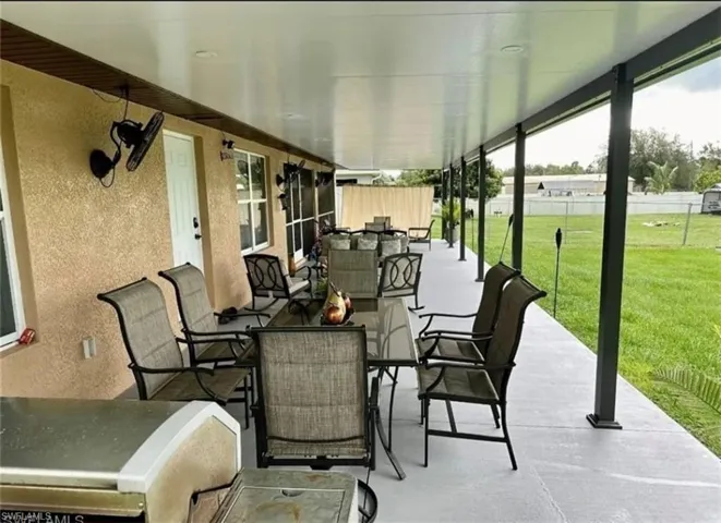 View of patio featuring outdoor dining area