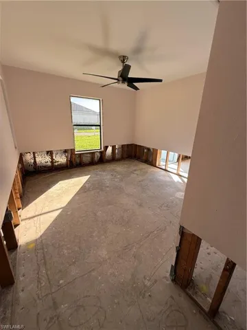 Unfurnished room with ceiling fan