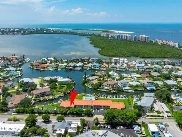Aerial view of residential area with a large body of water
