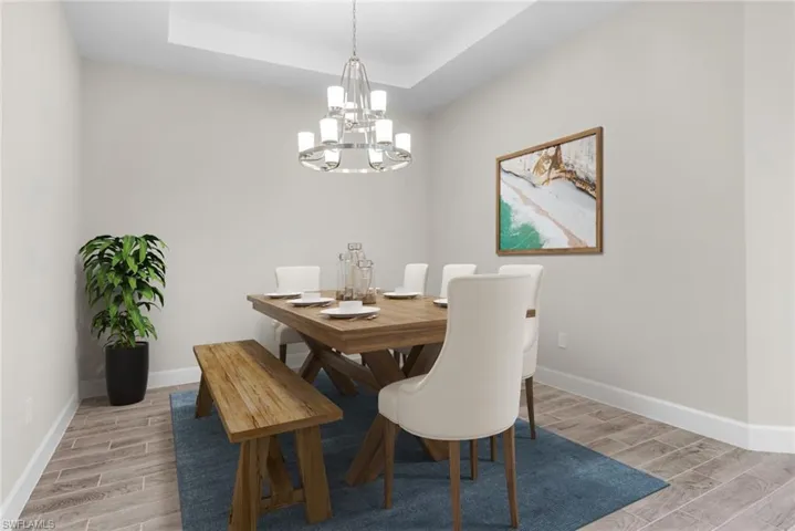 Den/dining area/ virtually staged