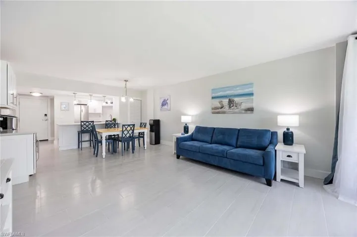 Living area featuring baseboards