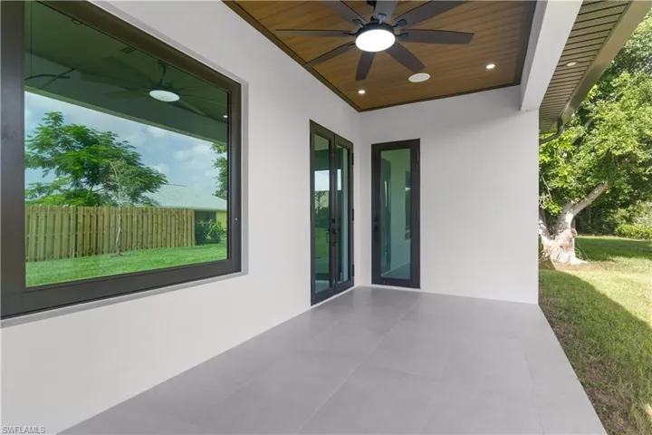View of patio with ceiling fan