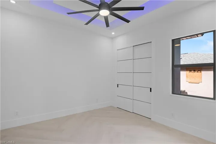 Empty room featuring recessed lighting and ceiling fan