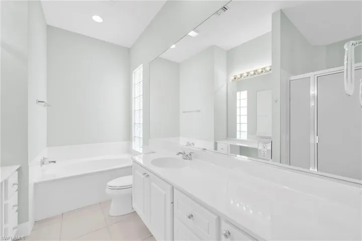 Primary Bathroom with bathtub,