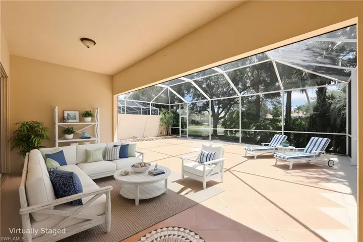 Virtually staged covered patio and screened-in Lanai
