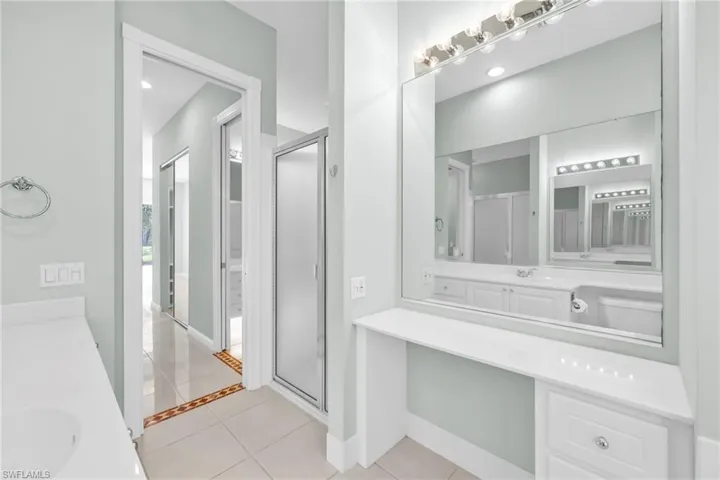 Additional powder room/area in primary Bathroom.