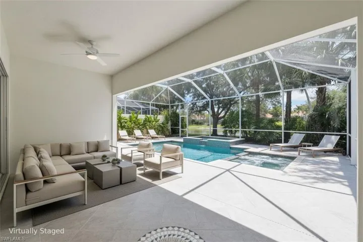Virtually staged Lanai with a pool & spa