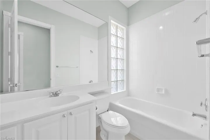 Guest Bathroom with bath/shower tub