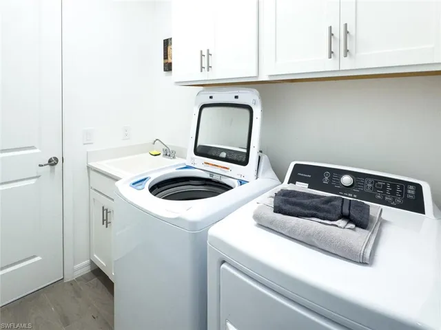 Laundry room with sink