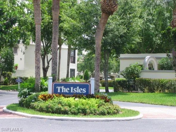 This 2 BR+Den, 2 BA condo is located in The Isles II of Caloosa Yacht & Racquet Club.