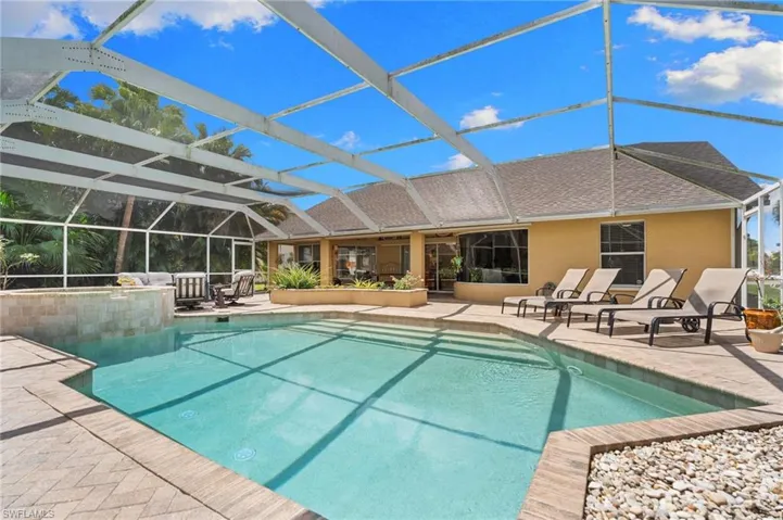 Large pool with view of the home in the back